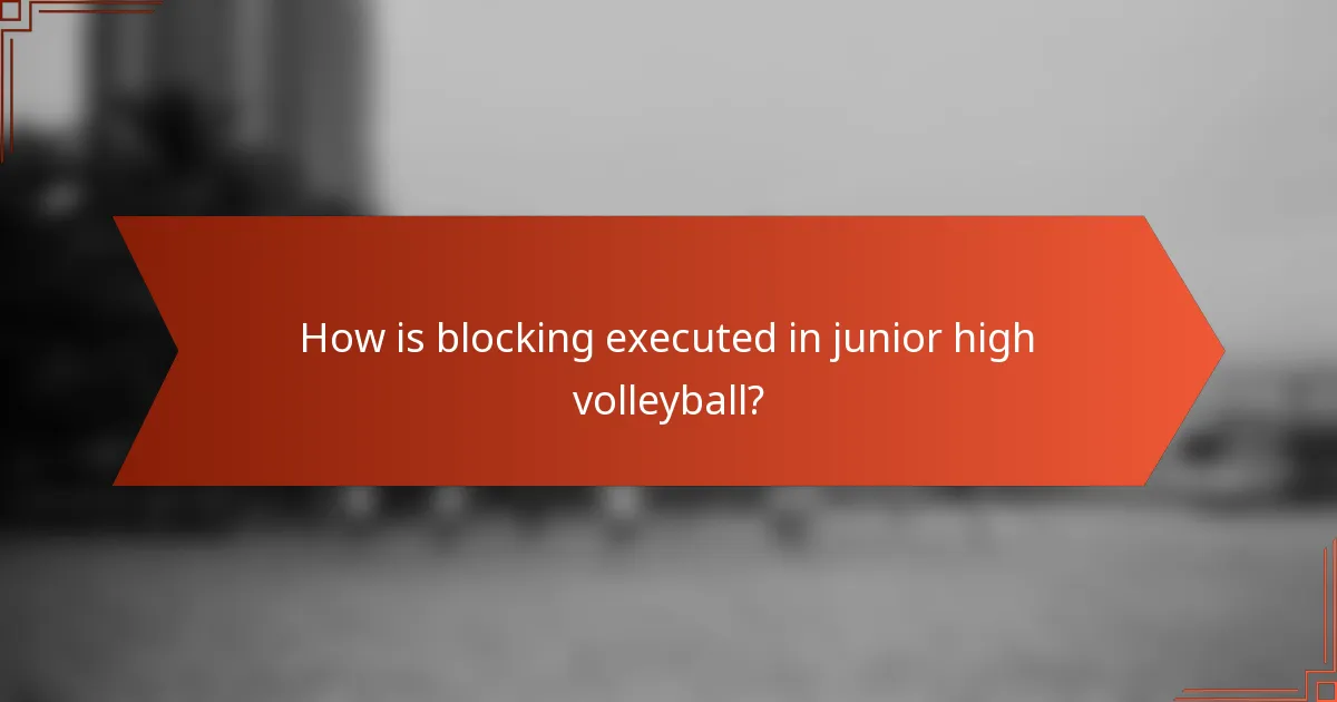 How is blocking executed in junior high volleyball?